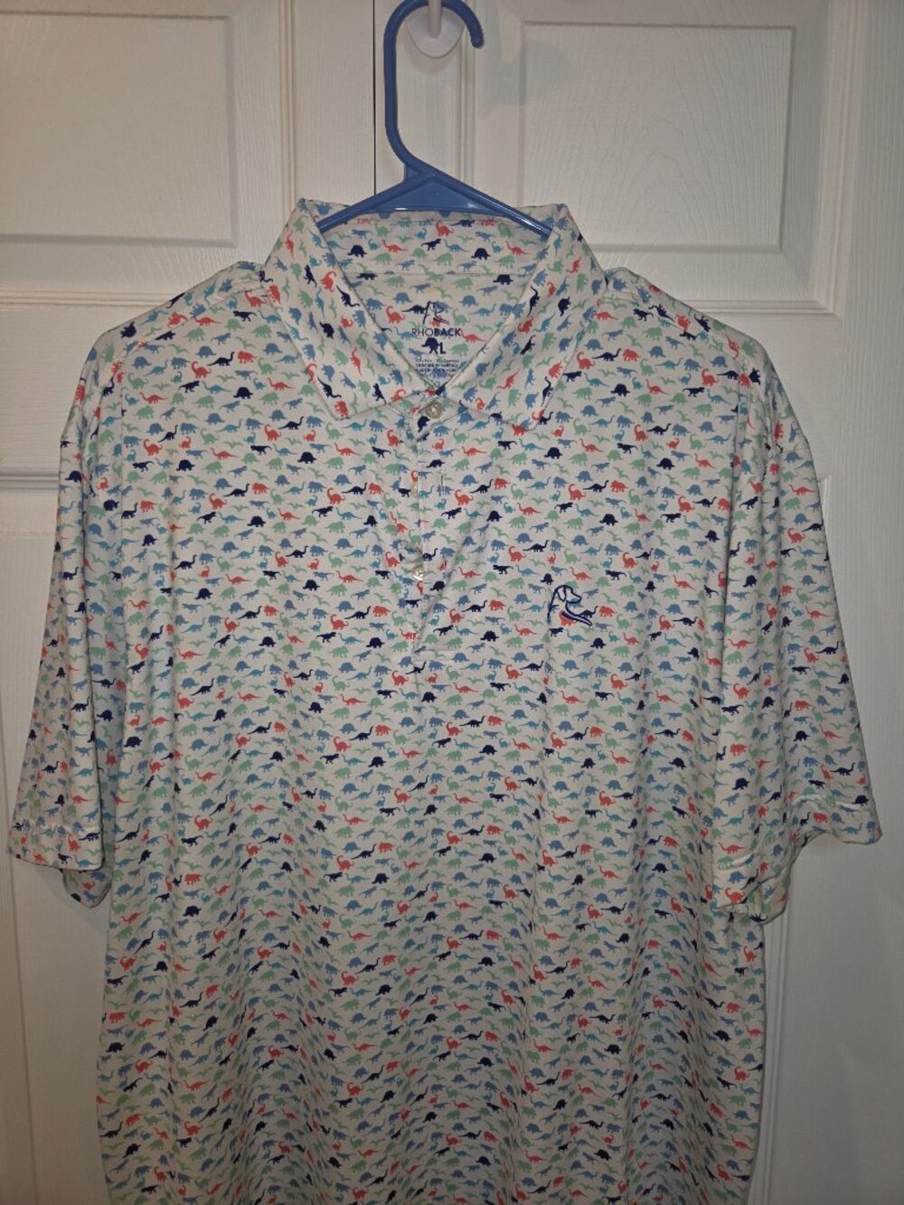 Rhoback The Dino polo. Size XL